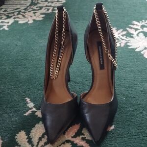 BCBG Gold and Black Stiletto Heels with Chain Detail